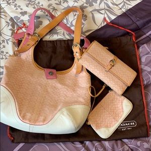 Pink coach includes wristlet and wallet